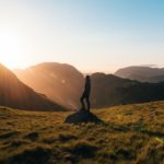 a hiker hiking in a valley